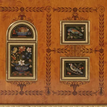 close up of inlaid decoration of flowers and birds on wooden cabinet